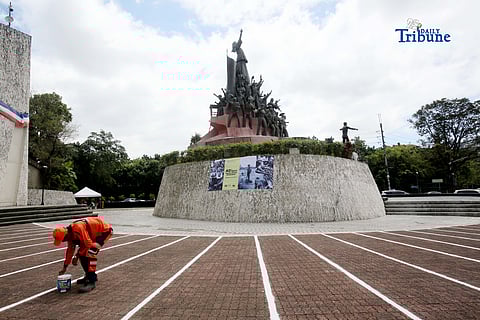 (February 24 2026) DPWH workers seen re-paint around the People Power Monument on Tuesday February 23 2026, a day before the 40th Edsa people power celebration. Analy Labor
