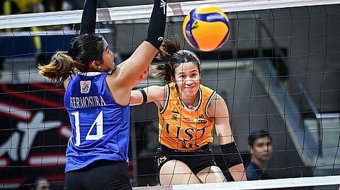 REG Jurado of UST unloads a booming kill over the defense of Ana Hermosura of Ateneo during their UAAP Season 88 women’s volleyball tournament game on Thursday. The Tigresses prevailed, 26-24, 25-18, 25-21.