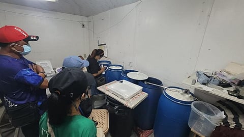 The PDEA raids a warehouse serving as a meth lab in Bulacan