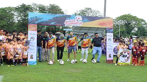 PRESIDENT and CEO of Davao Light and Power Company Enric Zak Tia, DSRFA President Ernie Ortonio Jr., Impact Load Climate Action of the Aboitiz Foundation Inc.’s Welfredo Dalumpines formally open the Aboitiz Football Cup Season 25 on Saturday at the Tionko Turf.