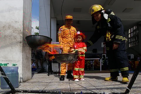 School children learn fire safety