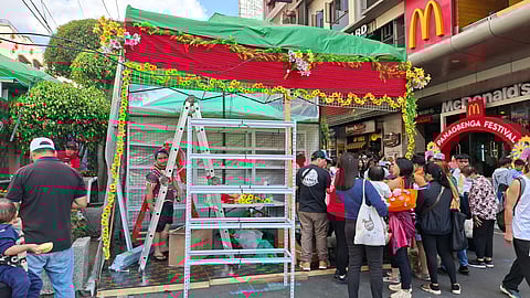 STALL owners prepare to set up shop for the celebration of Panagbenga in Baguio City.