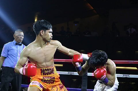 EMAN Bacosa Pacquiao scores a fourth-round stoppage of Indonesian Reynold Kundimang late Saturday in Bohol.