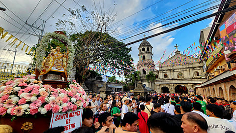 IMAGE of Santa Marta de Pebrero arriving at the church during the traslacion procession on 30 January, the first day of the nobenaryo.