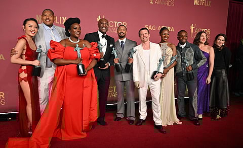 Chinese-US actress Li Jun Li, US actor Omar Miller, Nigerian-British actor Wunmi Mosaku, British actor Delroy Lindo, US actor Michael B. Jordan, British actor Jack O'Connell, US actress singer songwriter Jayme Lawson, US actor Miles Caton, and US casting director Francine Maisler pose with the Outstanding Performance by a Cast in a Motion Picture for ‘Sinners’ during the 32nd Annual Actor Awards. 