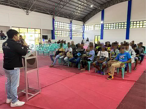From Conflict to Reconciliation — Former rebels in Aklan receive assistance from government troops while filing their amnesty applications before the Local Amnesty Board Iloilo in Ibajay, reinforcing the state’s peace-building initiatives.