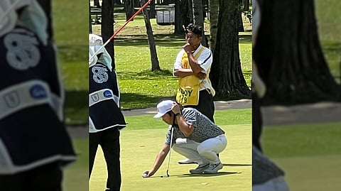 PERRY Josef Bucay lines up his shot on the 18th hole at Apo Golf and Country Club.