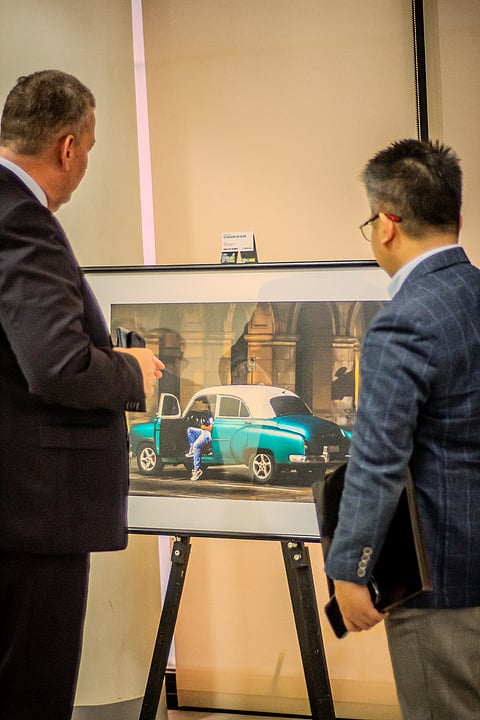 STEPHAN Holzinger’s “Moments of Life, Live Moments” captures urban life, supports youth programs.