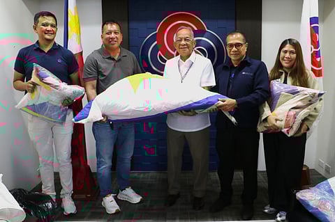 Subic Bay Metropolitan Authority (SBMA) Chairman and Administrator Eduardo Jose L. Aliño (center) leads the turnover of its worn-out Philippine flags to Barangay Captain Vicielito Balan (2nd from left) of Alion, Mariveles, Bataan, for inclusion in the flag disposal program on March 13 in compliance with Republic Act 8491. Assisting the turnover were SBMA acting-Deputy Administrator for Administration Vicente Evidente, Jr. (2nd from right), SBMA Procurement & Property Management Department (PPMD) acting-manager Jennifer Guiang (right), and PPMD Division Chief Dennis Rolan Baviera (left).