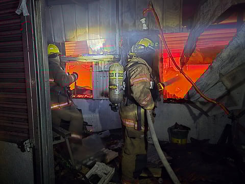 Volunteer firefighters during the Binangonan Public Market Fire in Rizal. 