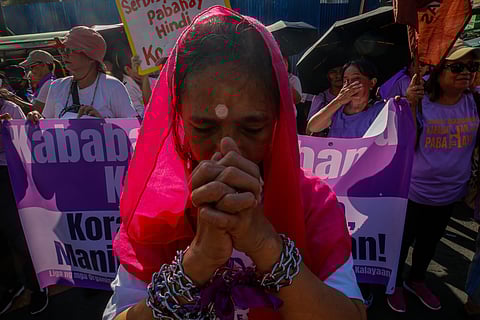 Women's rights advocates gather at Mendiola, Manila, on Saturday morning, ahead of International Women's Day, to call for decent housing for all, an end to corruption, and the demilitarization of rural areas.