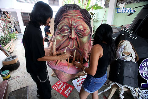 Ahead of the celebration of International Women’s Day, artists from Gabriela put the finishing touches on an effigy titled “Mga Big Fish ng Korapsyon: President Ferdinand Marcos Jr. and Vice President Sara Duterte” in preparation for their rally event at Liwasang Bonifacio in Manila, highlighting issues of corruption and governance, on Saturday, 07 March 2026.