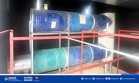 THE Eco-Dryer’s biomass-fed heating system provides year-round, climate-resilient drying of water hyacinths for local weavers. 