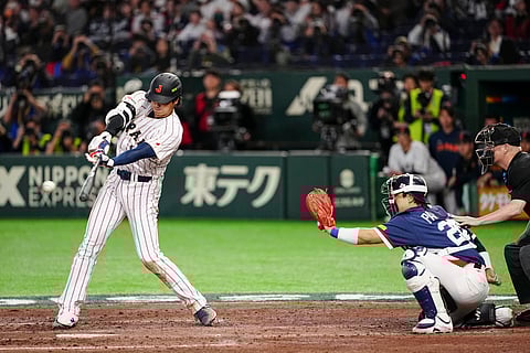 SHOHEI Ohtani  blasts a home run that gave Japan an 8-6 win over South Korea in the World Baseball Classic.