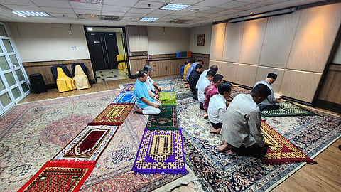 EMBASSY staff gathered for the Maghrib prayer at sundown.
