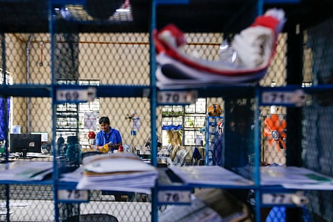 Philippine Postal Corporation (PHLPost) personnel sort mail at the Manila Central Post Office in Liwasang Bonifacio, Manila, on 09 March 2026. The PHLPost is currently implementing a compressed workweek among personnel whose duties cannot be rendered remotely and those in the mail operations to ensure uninterrupted service delivery. 