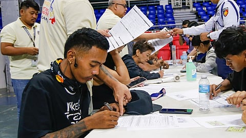 READY for the barangay vote Amid long tables and stacks of forms at the Rizal Memorial Coliseum in Manila, residents line up to sign their names into the democratic roll, taking advantage of the Commission on Elections’ Special Register Anywhere/Anytime Program. The initiative allows qualified voters to register or update their records ahead of the Barangay and Sangguniang Kabataan Elections set for November.