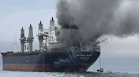 SMOKE rises from the Thai bulk carrier ‘Mayuree Naree’ near the Strait of Hormuz after an attack.
