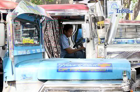 (March 11 2026) Driver’s of the traditional jeepney’s seen preparing their jeep while waiting for their designated trips, in a terminal in Quezon City on Wednesday, March 11, 2026.  Transport group Piston is set to file a petition on March 16 seeking a P2 provisional fare increase, which would raise the minimum jeepney fare to P15, citing a sharp rise in fuel prices that has pushed pump costs up by P17 to P24 per liter. Meanwhile, Land Transportation Franchising and Regulatory Board (LTFRB) Chairman Vigor Mendoza said the agency is considering implementing a provisional fare adjustment as diesel prices are projected to climb to P80 per liter. Photo/Analy Labor 