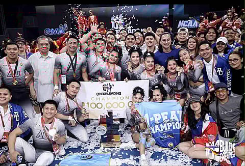 MEMBERS of the victorious Arellano University cheerdance group strike a pose after winning their seventh straight NCAA crown Thursday at the Mall of Asia Arena.