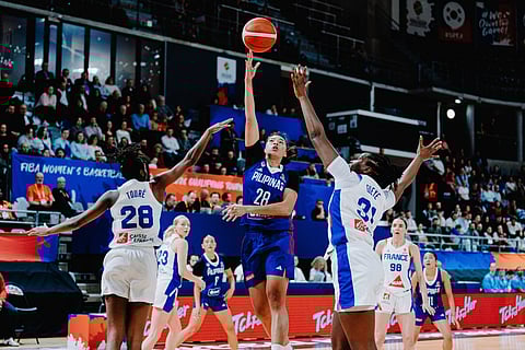GILAS Women’s Kacey dela Rosa attempts to score against Paris Olympics silver medalist France at the start of the FIBA World Cup Qualifying in Lyon. The French won, 115-66.