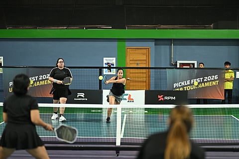 JAMMY Jueza-Entera plays a backhand return at the kitchen line as teammate Berdhel Galon looks on during the women’s doubles 20+ Novice division gold medal match against Bless Maiso and Gail Bercede in the Kosmas Pickle Fest 2026.