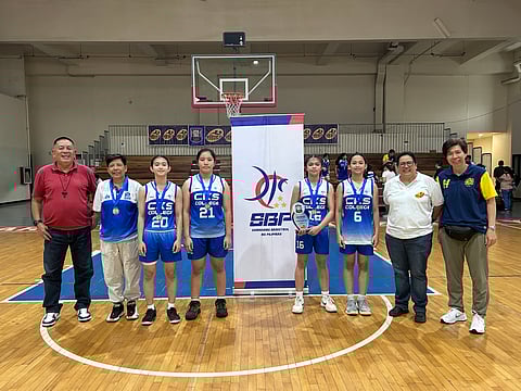 WOMEN’S Basketball League Commisioner Mario Montiel congratulates Chiang Kai Shek College coach Cristina Dela Cruz and her players Irish Joyce De Guzman, Lorie Jane Araza, Junia Madison Raymundo, and Alyanna Techico for winning the WBL 3x3 13U championship trophy over the weekend. Also shown are Monica Jorge, executive director of the BEST Center Sports Inc. and coach Diana Sy.