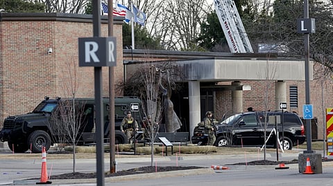 POLICE remain on site at the Temple Israel synagogue in West Bloomfield, Michigan, a Detroit suburb, on 12 March 2026, after an assailant drove a vehicle into the building.