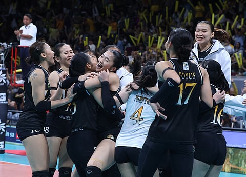 UST celebrates its 25-17, 25-18, 25-20 win over FEU in Season 88 UAAP women’s volleyball tournament Saturday at the Smart Araneta Coliseum.