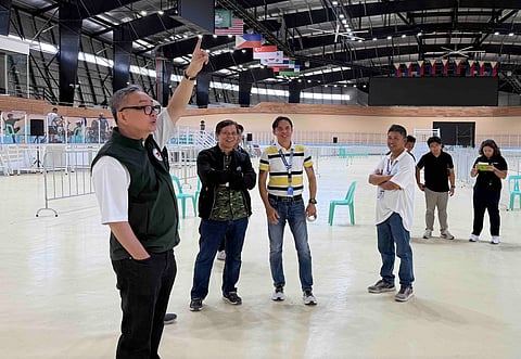 PHILCYCLING president Abraham 'Bambol' Tolentino checks on the progress of preparations at the Tagaytay CT Velodrome.