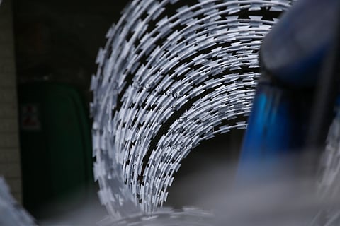 Police personnel are on high alert as streets leading to Malacañang are once again barricaded with razor wire on Sunday, 15 March 2026. Nicanor Padilla, Mendiola, and Arlegui streets remain open to foot traffic only.