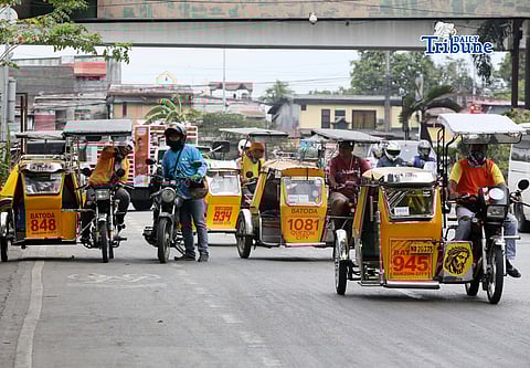 (March 16 2026) Tricycle queue as they wait for passengers at their terminal in Batasan Hills, Quezon City, on Monday, March 16, 2026. The Department of Social Welfare and Development (DSW) is set to begin the distribution of P5000 cash aid to tricycle drivers in 39 designated payout centres in Metro Manila tomorrow March 17, The cash aid, aimed to help drivers affected by soaring fuel prices. Photo/Analy Labor
