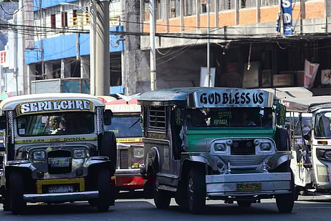 Public Utility Jeepneys (PUJs) ply their route at Recto Avenue in Manila on 16 March 2026. The Land Transportation Franchising and Regulatory Board (LTFRB) recently approved a fare hike in Metro Manila to assist drivers struggling with surging fuel costs, as diesel prices are projected to exceed P100 per liter this week. 
