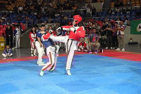 YOUNG taekwondo jins, like the one shown in red armor executing a powerful three-point head kick during a sparring match, are expected to gather to compete in the SMART/MVPSF National Carlos Palanca Jr. Taekwondo Championships this weekend.