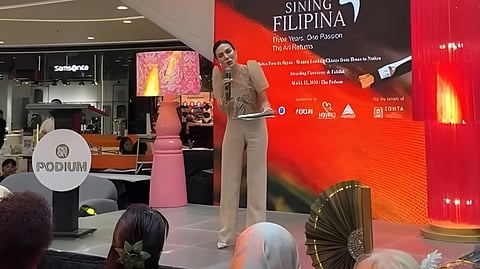 A SPEAKER addresses guests during the Sining Filipina 2026 awarding ceremony and exhibit opening at The Podium in Pasig City, recognizing the top 10 winning artworks selected from more than 250 entries nationwide.