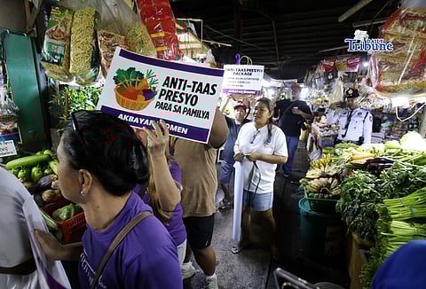 (March 18 2026) Akbayan women hold a protest at Kamuning Public Market in Quezon City on Wednesday March 18 2026, calling for stronger government support for women, low-income families, and small market vendors struggling with the continued rise in prices of basic goods and daily expenses, amid the on
