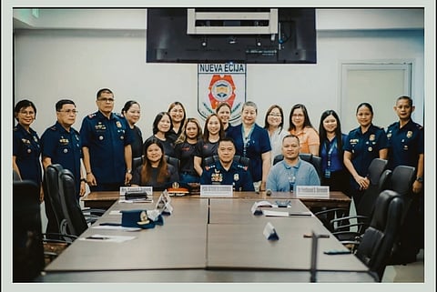 NEPPO officials, Family First Optical Clinic representatives, and NEPPO OLC members gather for a group photo after signing the MOA yesterday – bringing free eye care to police kids aged 15 and below.
