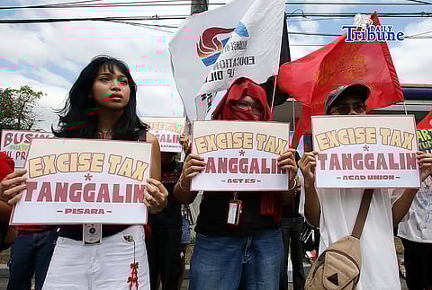 Various groups staged a protest at Philcoa along Commonwealth Avenue in Quezon City on Friday, condemning oil price hikes, calling to remove the excise tax and economic hardship caused by the Middle East conflict.

