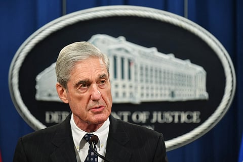 (FILES) Special Counsel Robert Mueller speaks on the investigation into Russian interference in the 2016 Presidential election, at the US Justice Department in Washington, DC, on May 29, 2019. Mueller, the former FBI director who led a politically explosive investigation into President Donald Trump, has died aged 81, US media reported on March 21, 2026.
