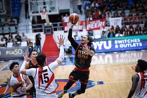 JOSHUA Munzon fires 29 points to help Titan Ultra stun San Miguel, 119-112, in the PBA Commissioner’s Cup on Saturday at the Ynares Center-Antipolo.