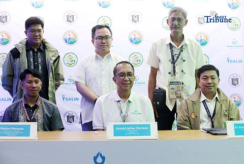 Marlon Marquez, Arnold Jether Mortera and Rodrigo Rodriguez Jr. formalize a partnership between the Department of Education divisions of Antipolo and Rizal and Manila Water through the signing of an agreement expanding the Salin: Lakbayan para sa mga Guro program in celebration of World Water Day in Quezon City on Monday. The initiative engages public school teachers in promoting water stewardship through experiential learning activities at company facilities.