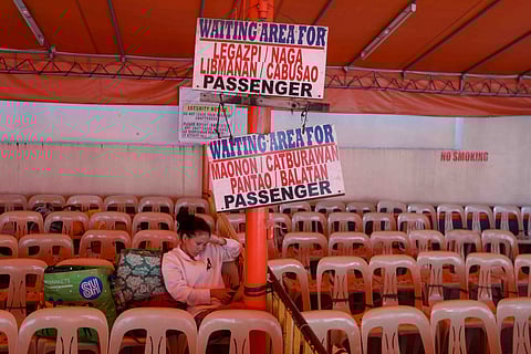 
Buses that travels from Manila to Bicol (and vice-versa) are seen parked in a station in Cubao, Quezon City on Tuesday, 24 March, 2026. 

