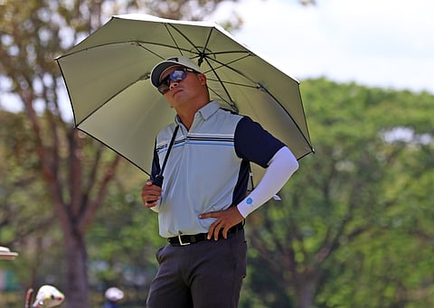 JUSTIN Quiban chills after carding a course record 10-under 62 to grab a four-shot lead in the opening round of the ICTSI Lakewood Championship in Cabanatuan City on Tuesday.