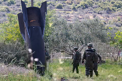 ISRAELI soldiers arrive to check an Iranian missile remnant that landed in the Israeli-occupied West Bank village of Hares. Since the United States and Israel unleashed strikes on Iran on 28 February, war has spread across the Middle East, with casualties reported in countries across the region.