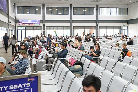 FERRY customers wait at the Batangas passenger terminal.
