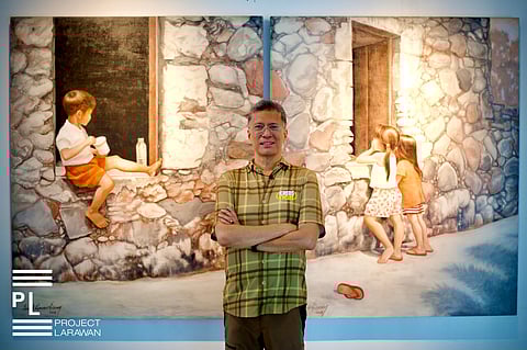 TONY Dans stands in front of a diptych of his mother, Araceli Limcaco-Dans. The painting is part of the legacy exhibition of painter and art educator Araceli Limcaco-Dans, titled Cheloy: Impressions from a Beautiful Soul, which will run at the UP Fine Arts Gallery until 31 March.