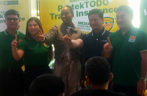 BEAUTY queen Chelsea Manalo with Palawan Group executives.