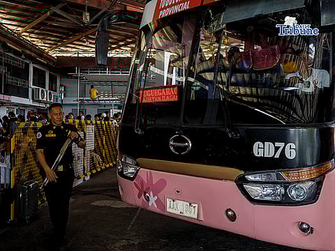 Passengers queue at a bus terminal in Sampaloc, Manila on Sunday, 29 March 2026, as they travel early to their respective provinces ahead of the Holy Week exodus.JohnCarloMagallon
