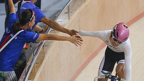 PATRICK Gerard Lee celebrates his bronze medal showing in the men’s elite scratch of the Asian Para Track Cycling Championships at the Tagaytay CT Velodrome.