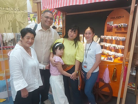 MAI Nadres (second from right) and her family and trusted artisan at Boho Manila.